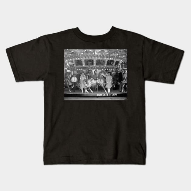 Children Riding Carousel, 1925. Vintage Photo Kids T-Shirt by historyphoto